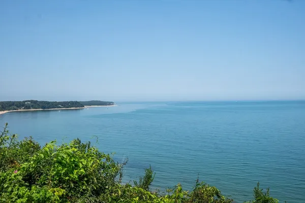 a view of a lake with a beach