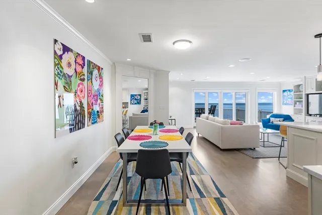 a bedroom with two beds and a window