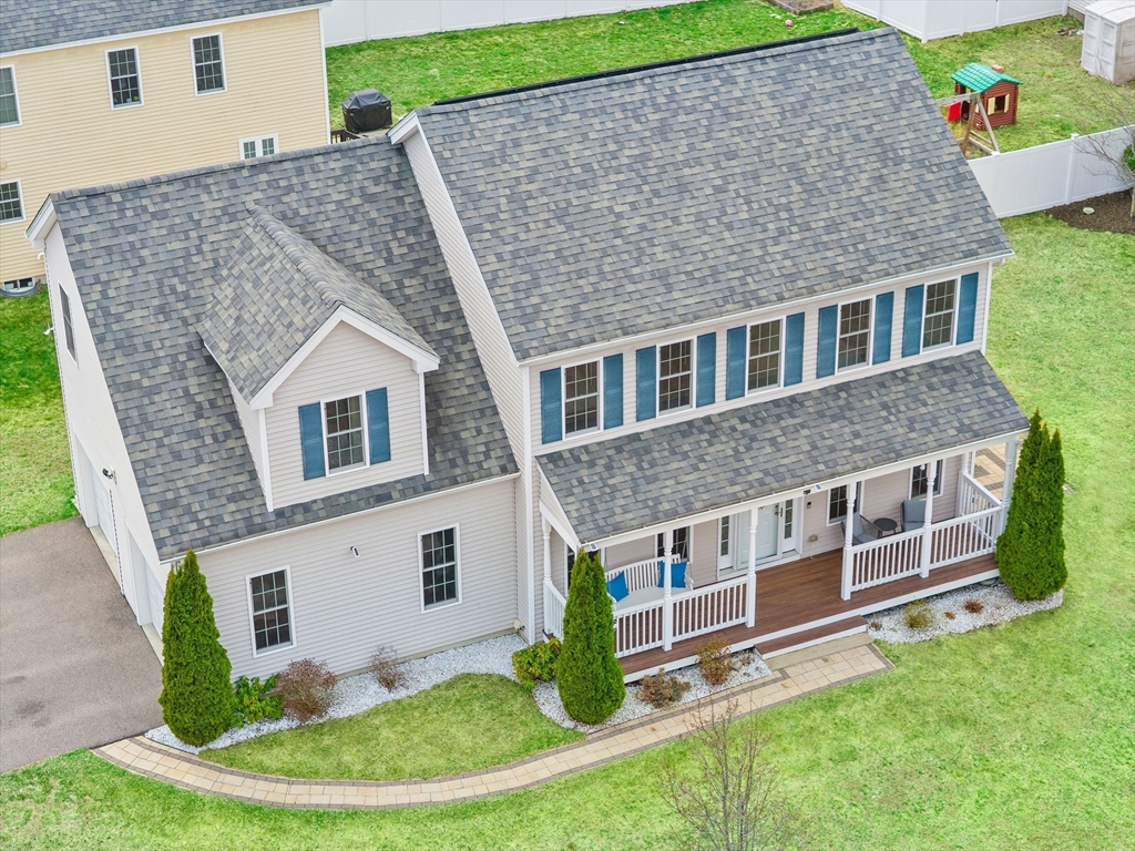 2 Northern Lights Way Bellingham, MA 02019 - Photo 2 of 40 a aerial view of a house with a yard potted plants