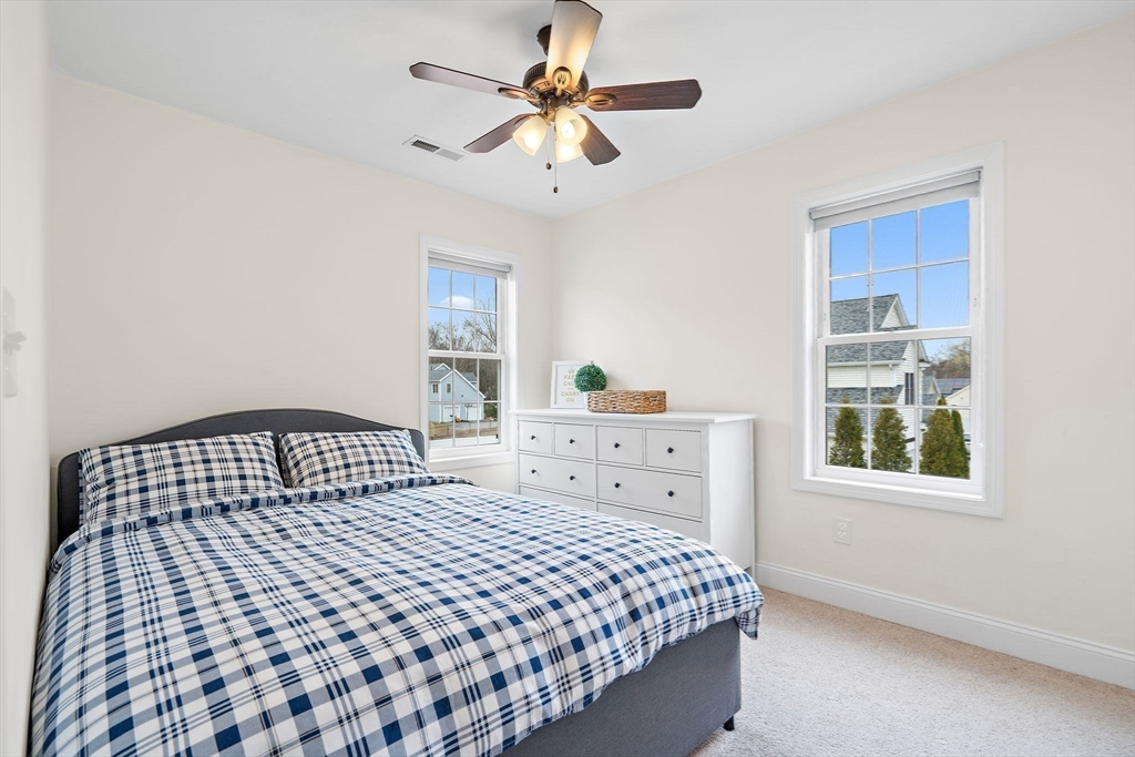 2 Northern Lights Way Bellingham, MA 02019 - Photo 26 of 40 a bedroom with a bed and a window