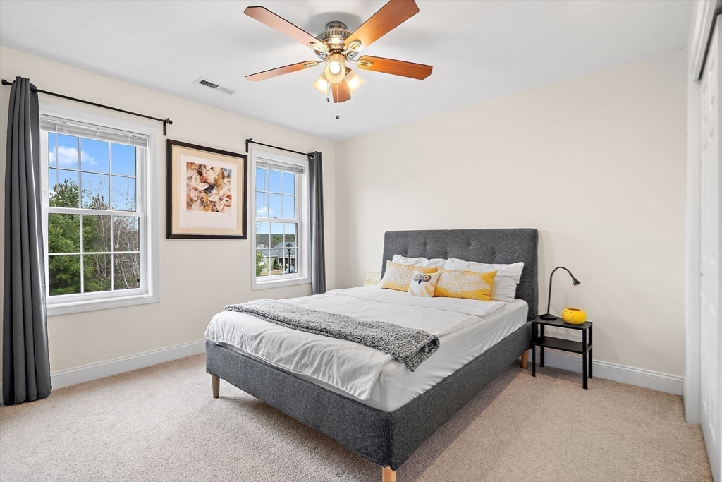 2 Northern Lights Way Bellingham, MA 02019 - Photo 27 of 40 a bedroom with a bed and a window