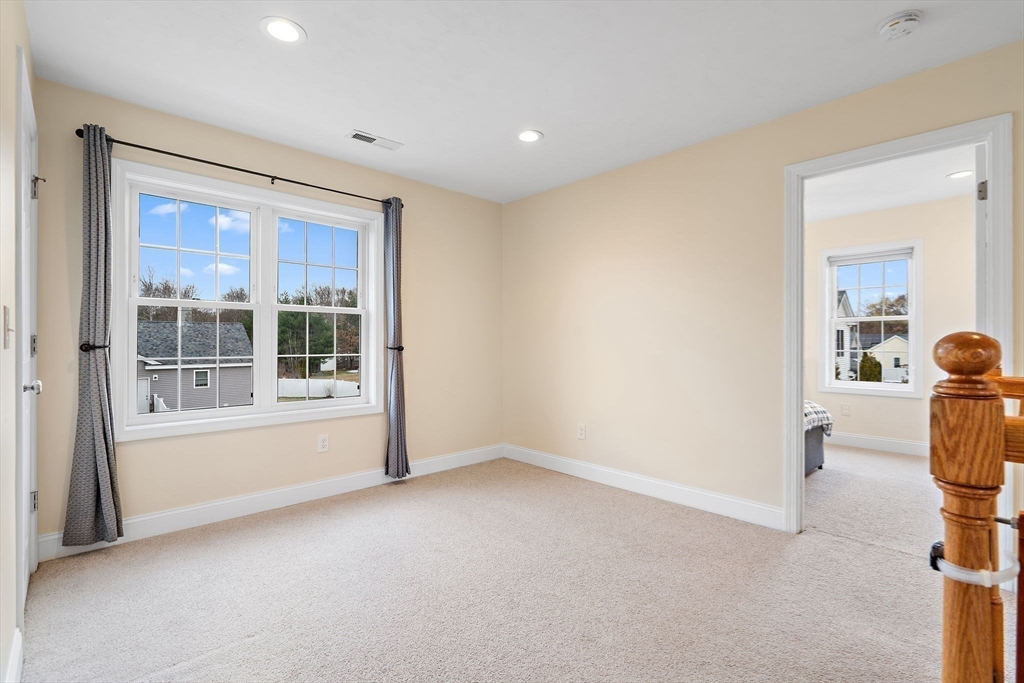 2 Northern Lights Way Bellingham, MA 02019 - Photo 29 of 40 a view of livingroom with furniture and front door