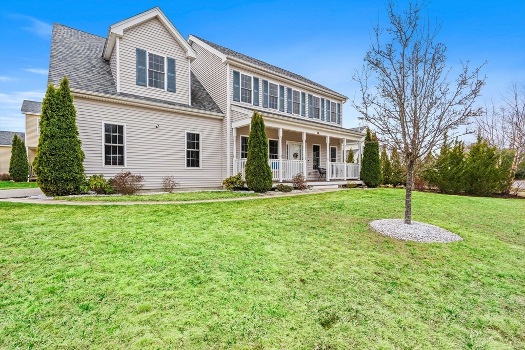 2 Northern Lights Way Bellingham, MA 02019 - Photo 36 of 40 a front view of house with yard and green space