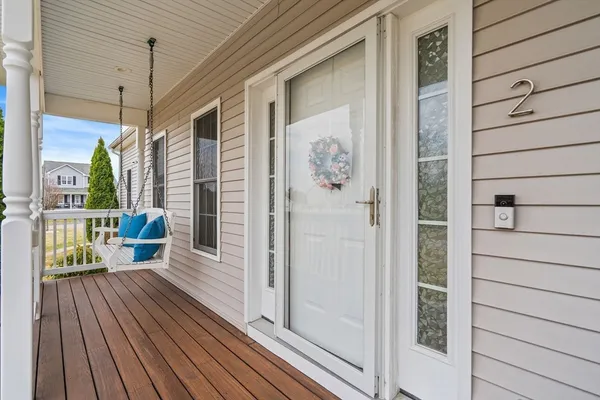a balcony with wooden floor