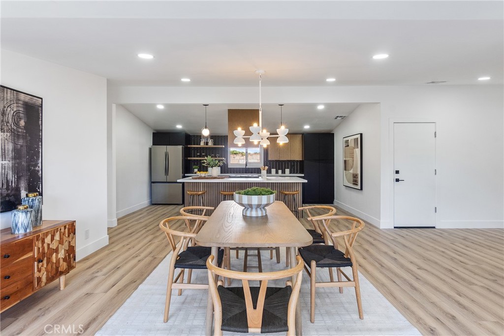6909 De Celis Place Van Nuys, CA 91406 - Photo 4 of 46 a view of a dining room with furniture