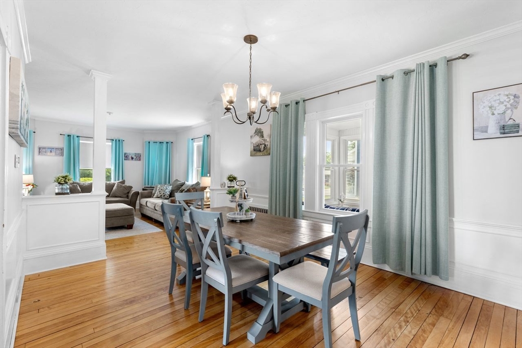 1012 Washington Street Whitman, MA 02382 - Photo 28 of 37 a view of a dining room with furniture and wooden floor
