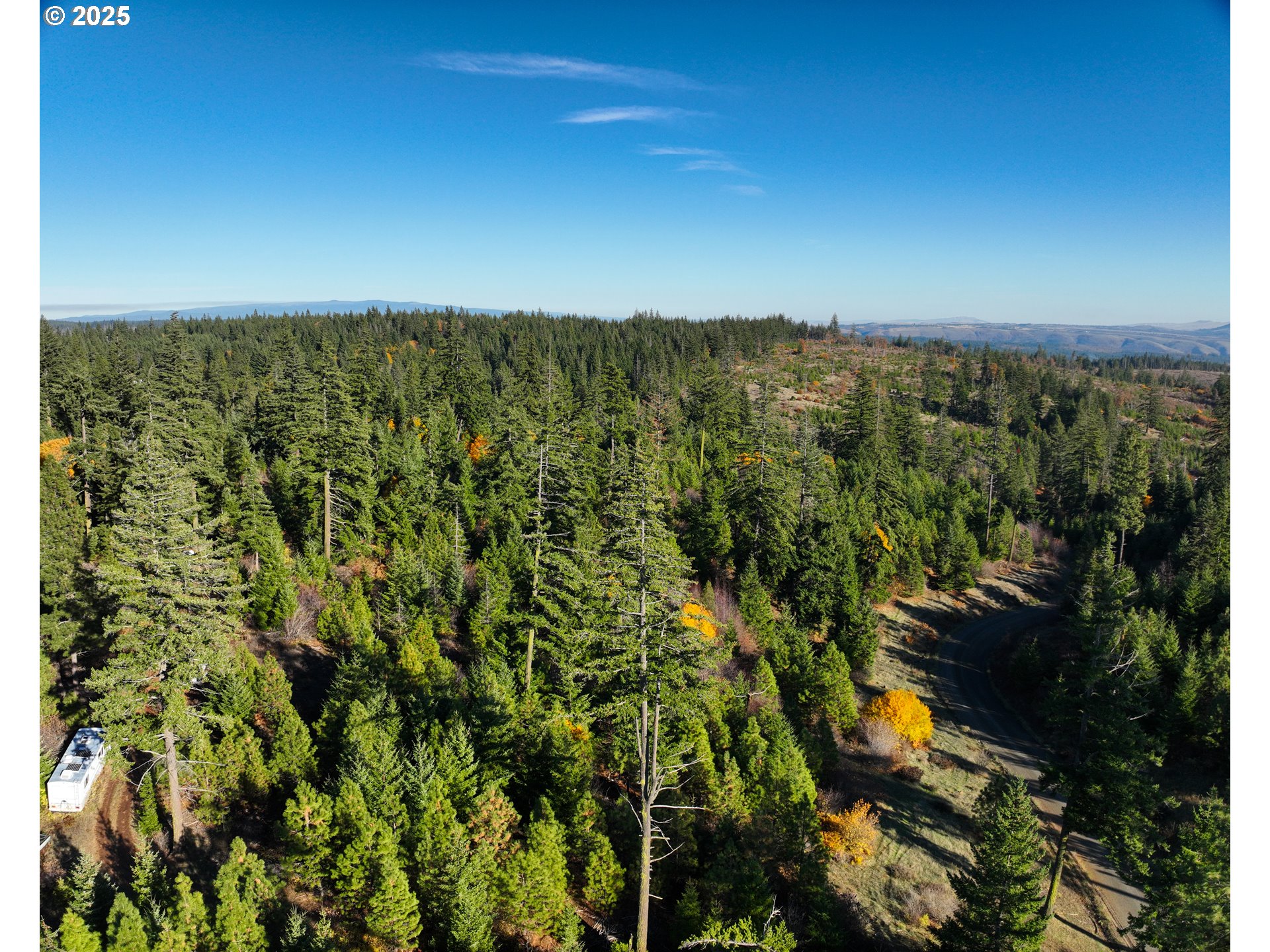 25 Remington Road Lyle, WA 98635 - Photo 7 of 10 a view of a city with lush green forest
