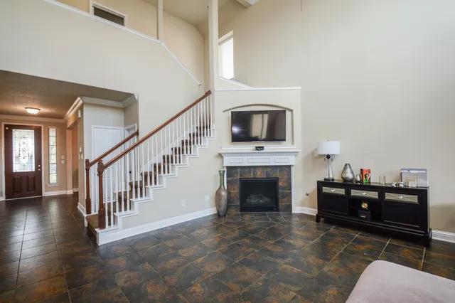 a living room with furniture or fireplace and a flat screen tv