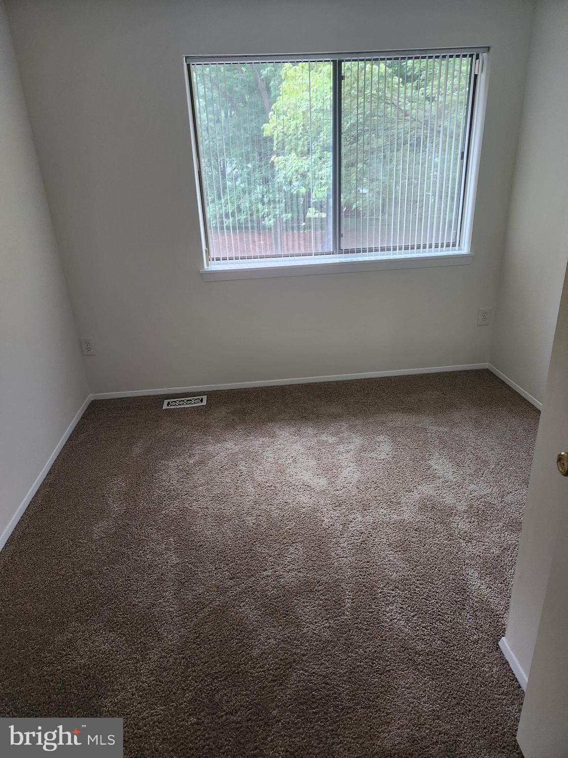 7104 Lasting Light Way Columbia, MD 21045 - Photo 21 of 40 an empty room with a window