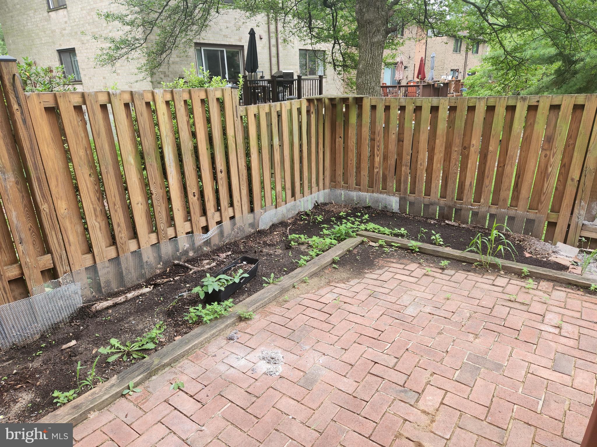 7104 Lasting Light Way Columbia, MD 21045 - Photo 35 of 40 a backyard of a house with a bench
