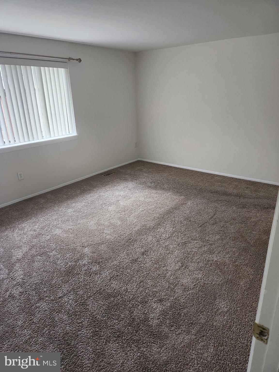 7104 Lasting Light Way Columbia, MD 21045 - Photo 9 of 40 an empty room with windows