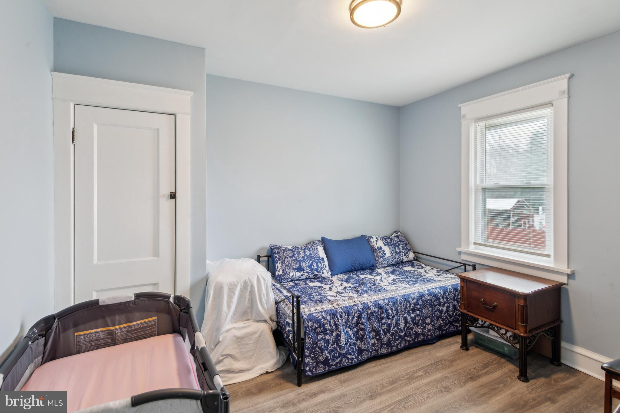 812 Lambert Avenue Mount Ephraim, NJ 08059 - Photo 14 of 24 a bedroom with a bed and window