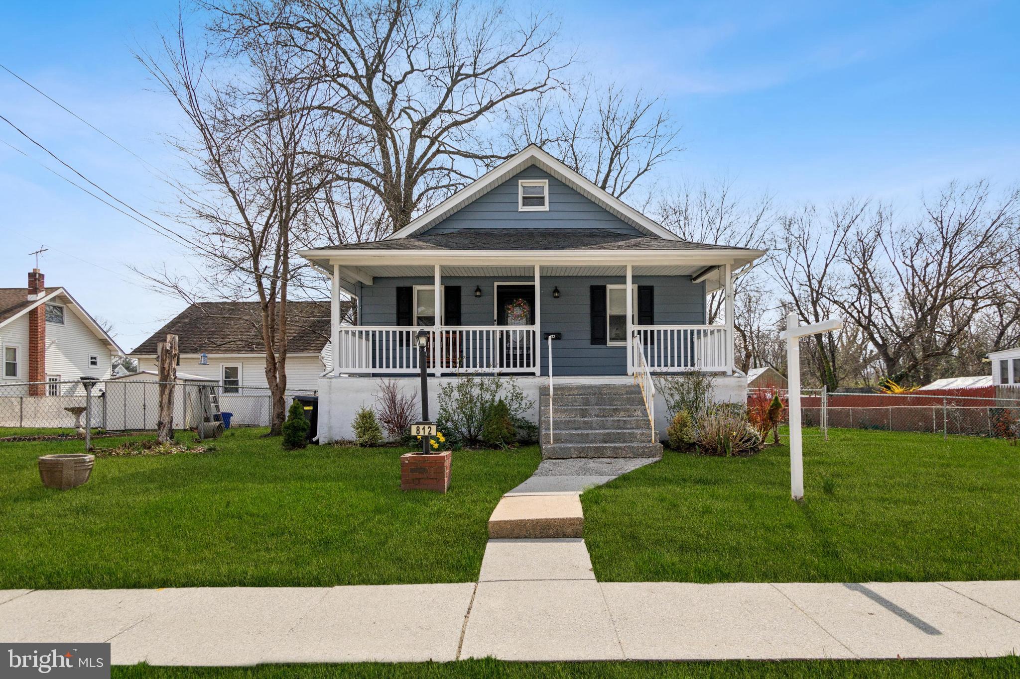 812 Lambert Avenue Mount Ephraim, NJ 08059 - Photo 2 of 24 a front view of a house with a yard