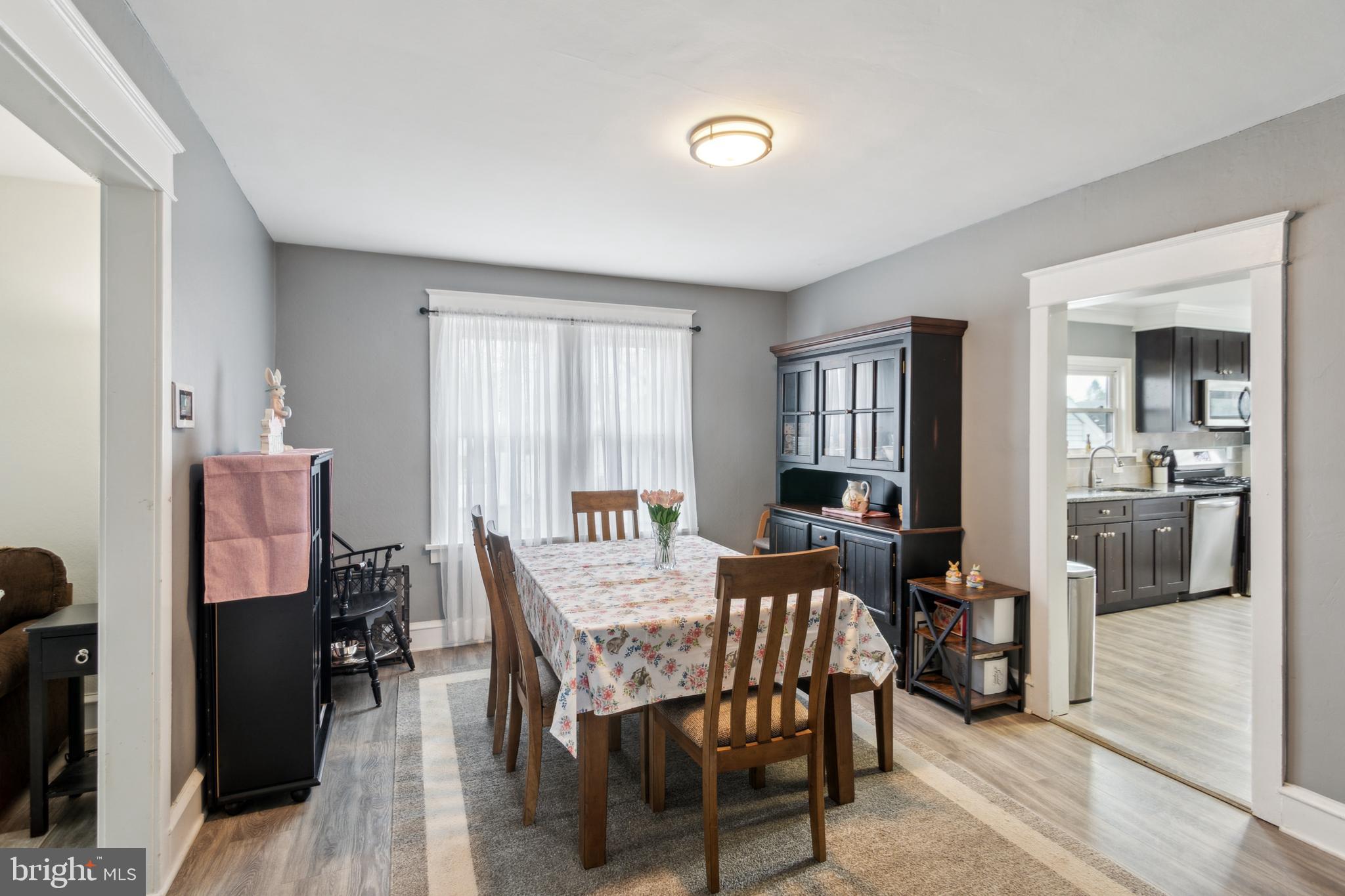812 Lambert Avenue Mount Ephraim, NJ 08059 - Photo 6 of 24 a view of a dining room with furniture and wooden floor