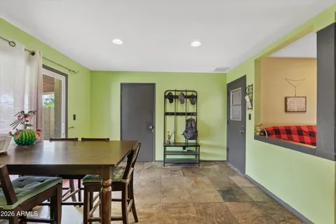 a view of a dining room with furniture