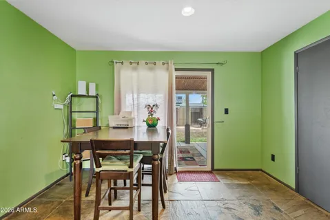 a workspace with furniture and window