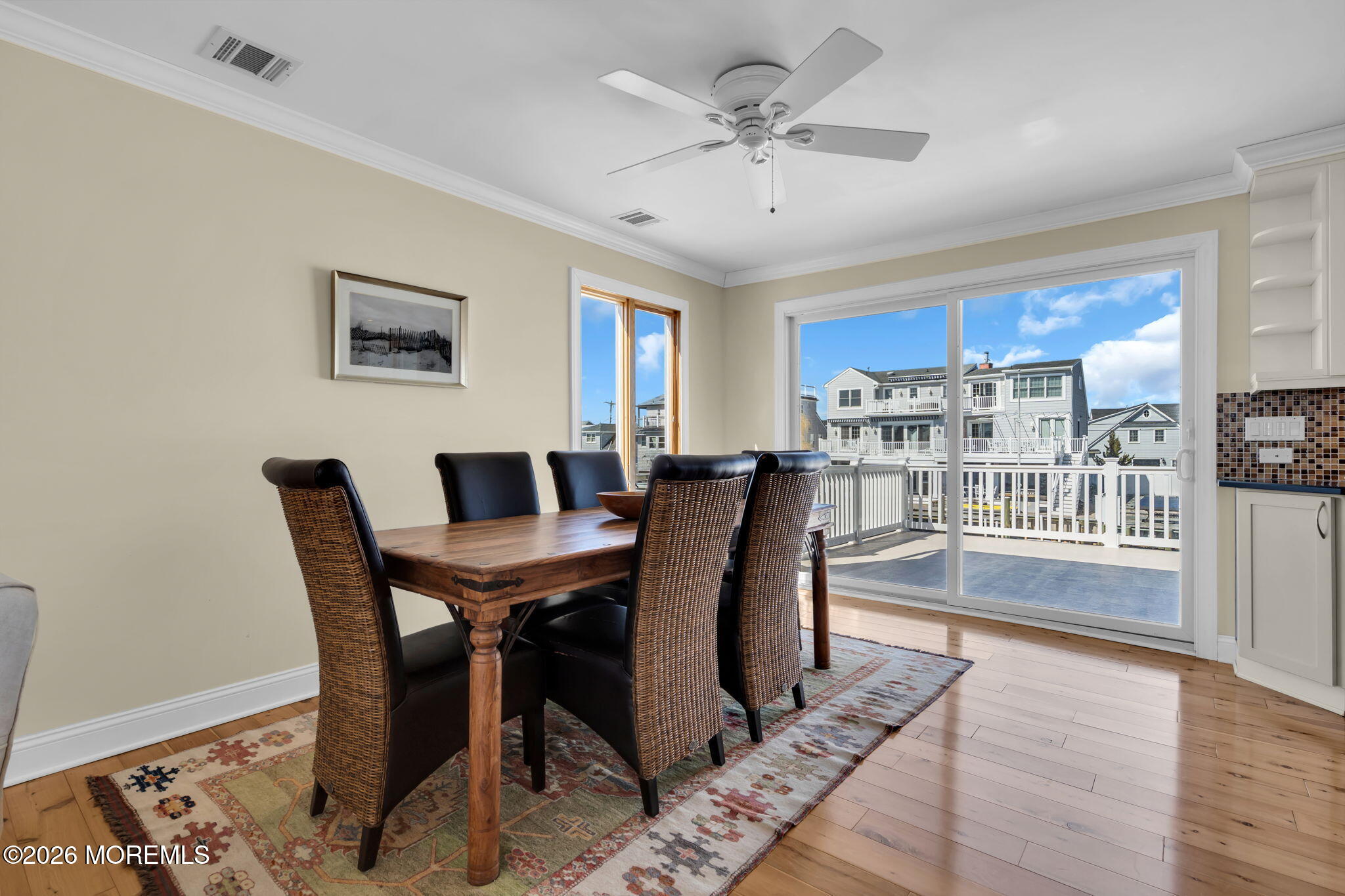 326 Cutter Lane Mantoloking, NJ 08738 - Photo 11 of 35 a view of a dining room with furniture