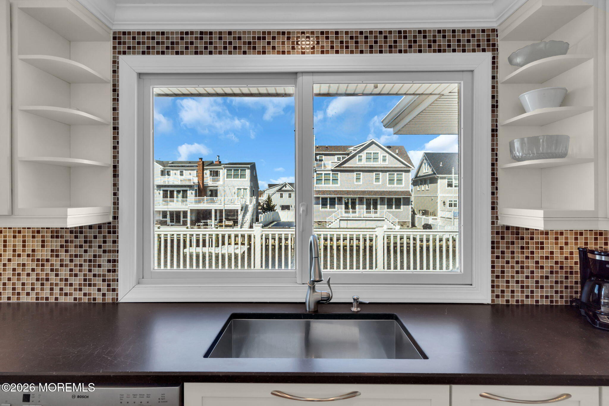 326 Cutter Lane Mantoloking, NJ 08738 - Photo 12 of 35 a view of a porch with a chair