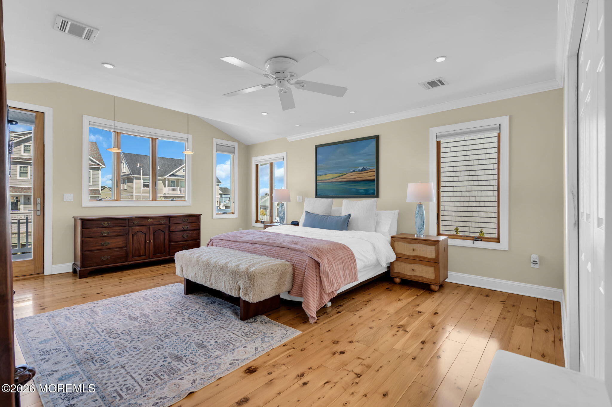 326 Cutter Lane Mantoloking, NJ 08738 - Photo 17 of 35 a spacious bedroom with a bed a window and dresser