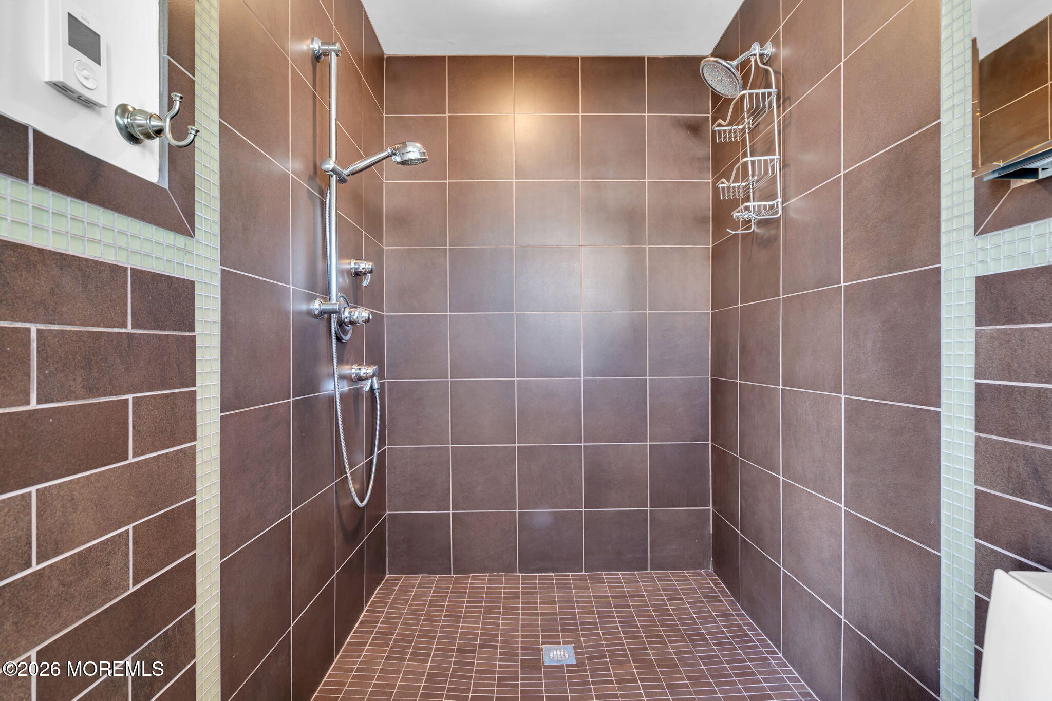 326 Cutter Lane Mantoloking, NJ 08738 - Photo 23 of 35 a bathroom with a shower