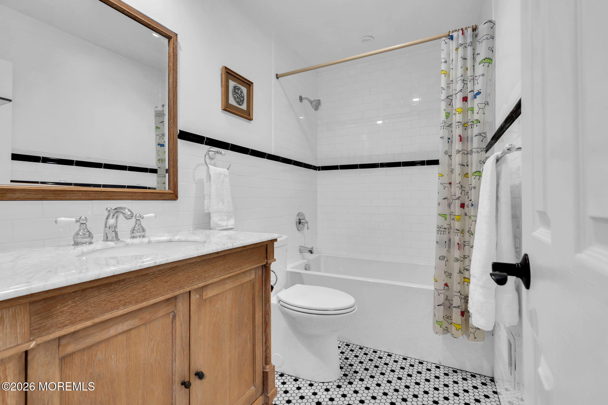 326 Cutter Lane Mantoloking, NJ 08738 - Photo 25 of 35 a bathroom with a sink a toilet a mirror a vanity and shower