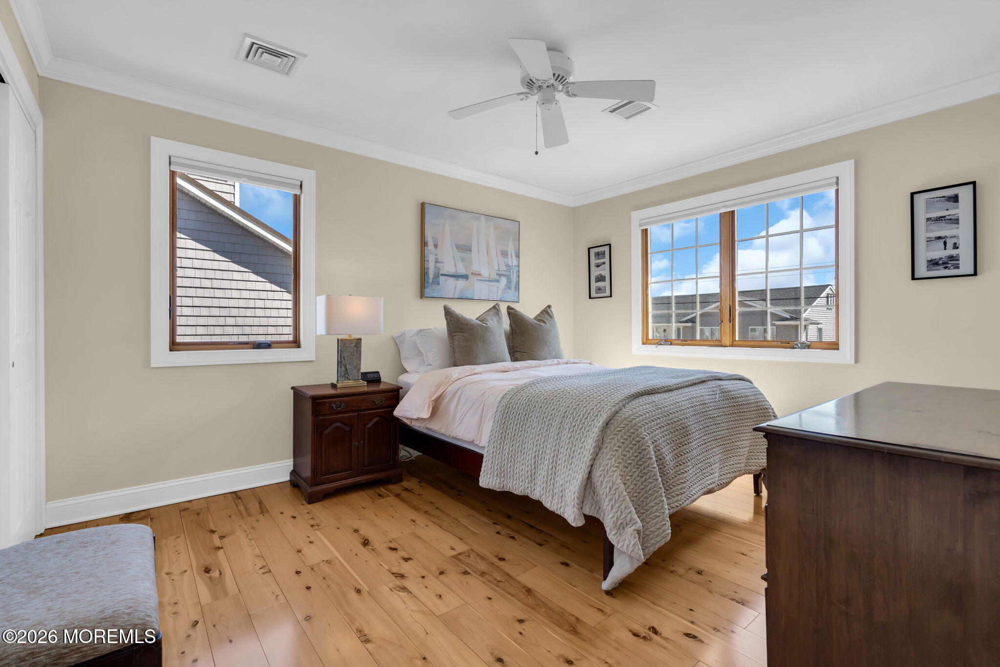 326 Cutter Lane Mantoloking, NJ 08738 - Photo 26 of 35 a bedroom with a large bed and a window