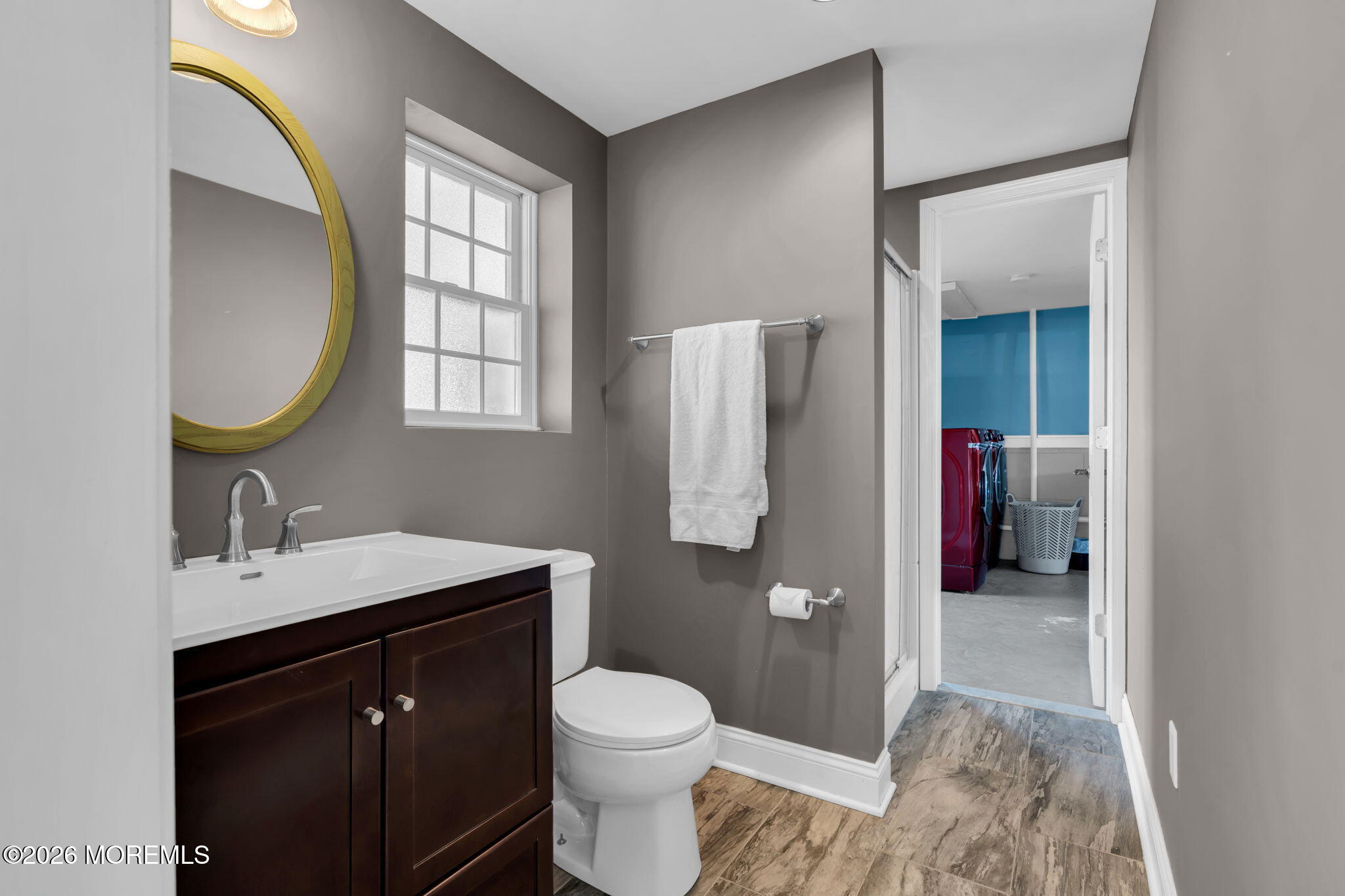 326 Cutter Lane Mantoloking, NJ 08738 - Photo 31 of 35 a bathroom with a sink and a mirror