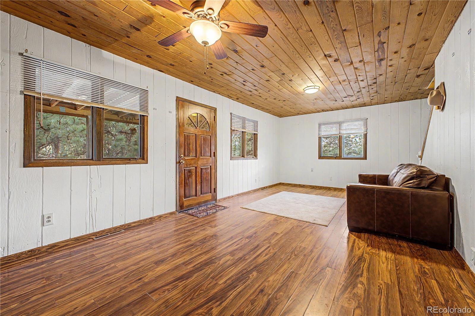 145 Bailey Drive Bailey, CO 80421 - Photo 5 of 31 a living room with furniture