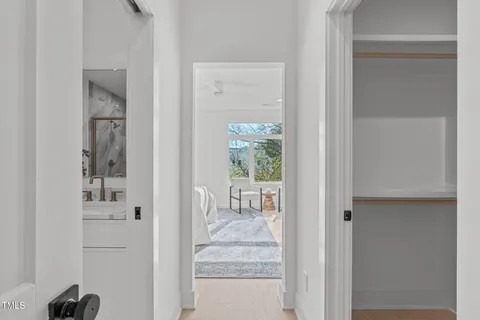 a view of a bathroom with a glass door