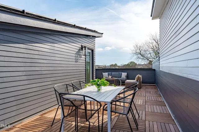 a view of a patio on the roof deck