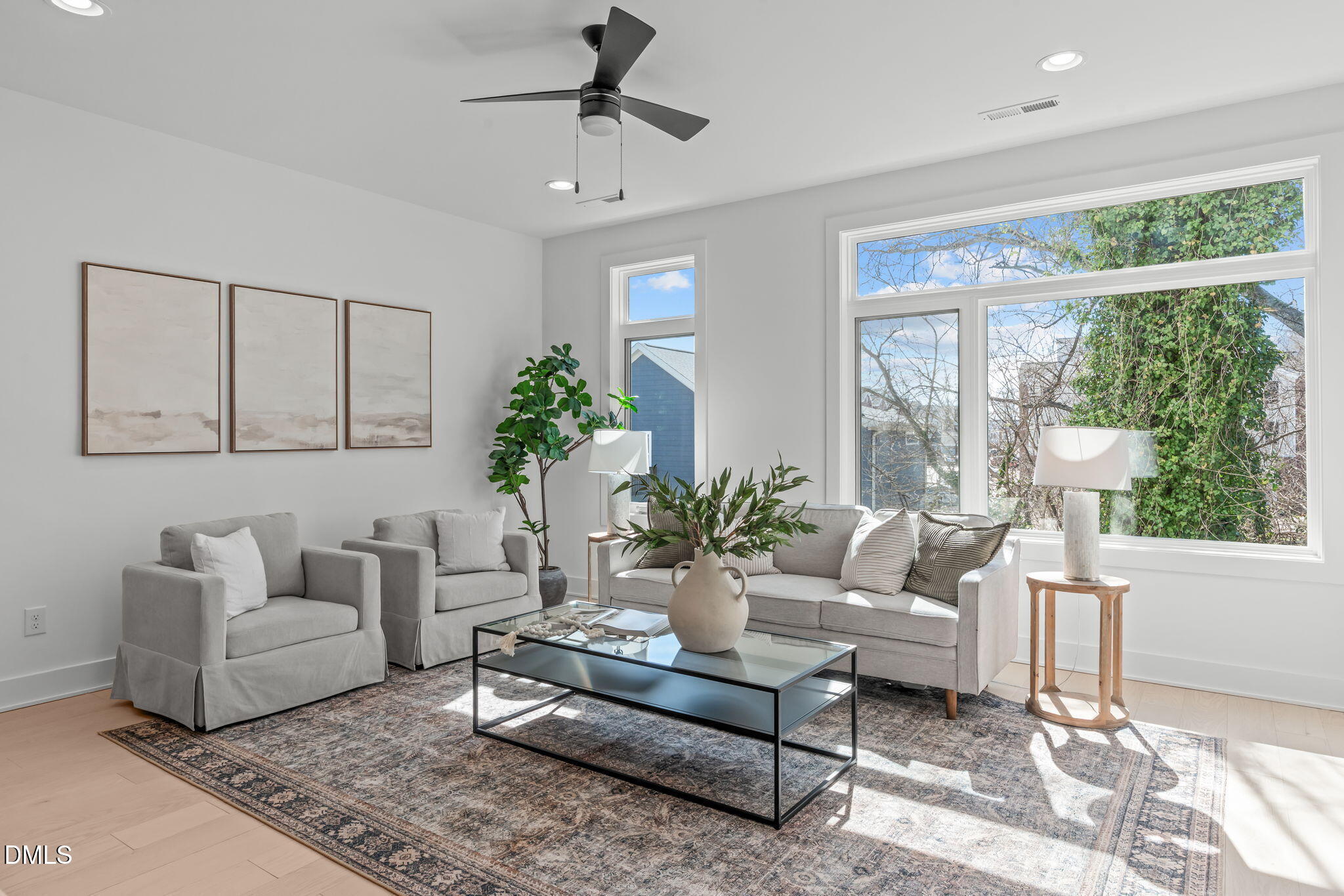 616 Rocky Knob Court Raleigh, NC 27601 - Photo 9 of 48 a living room with furniture and a large window