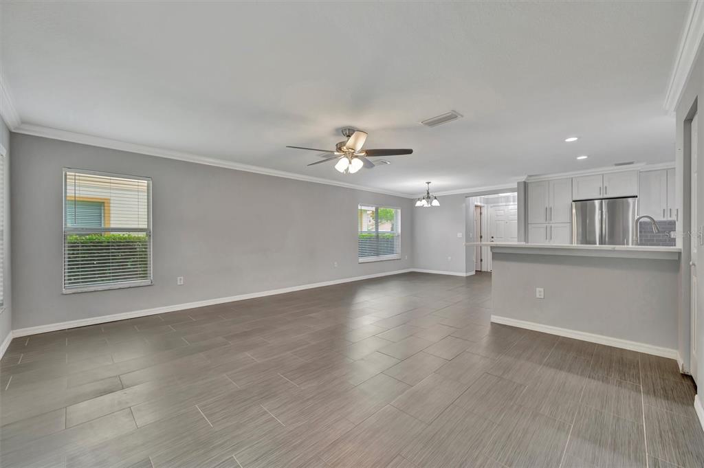 2928 Royal Tuscan Lane Valrico, FL 33594 - Photo 29 of 62 a view of an empty room with a window