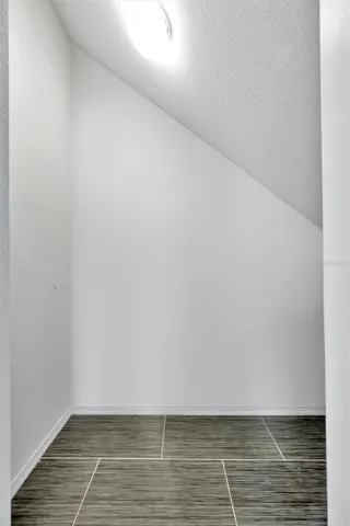 a bathroom with a sink a toilet and vanity