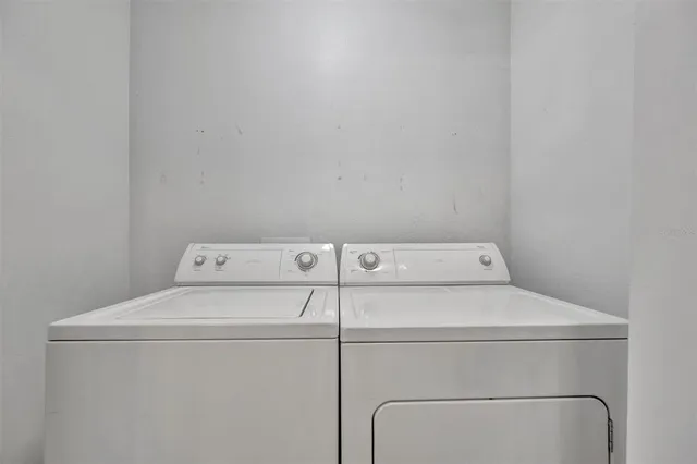 a bathroom with a toilet and a bathtub