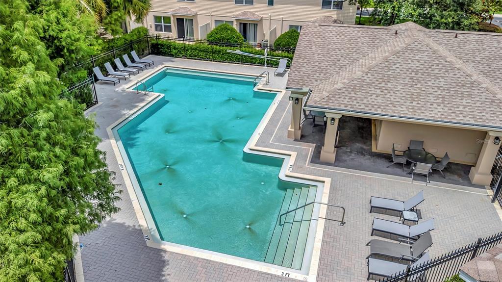 2928 Royal Tuscan Lane Valrico, FL 33594 - Photo 47 of 62 an aerial view of a house with swimming pool and porch