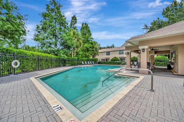 a view of a yard with a tree