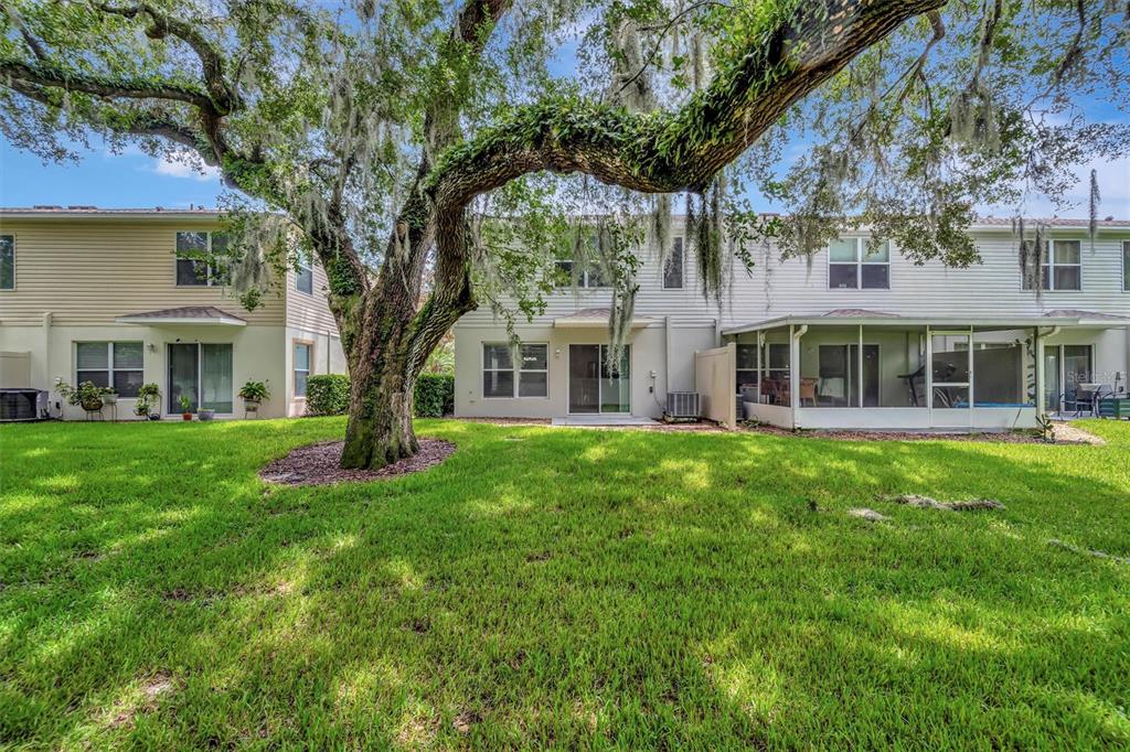 2928 Royal Tuscan Lane Valrico, FL 33594 - Photo 56 of 62 a view of a house with a yard