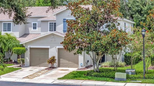 front view of a house with a yard