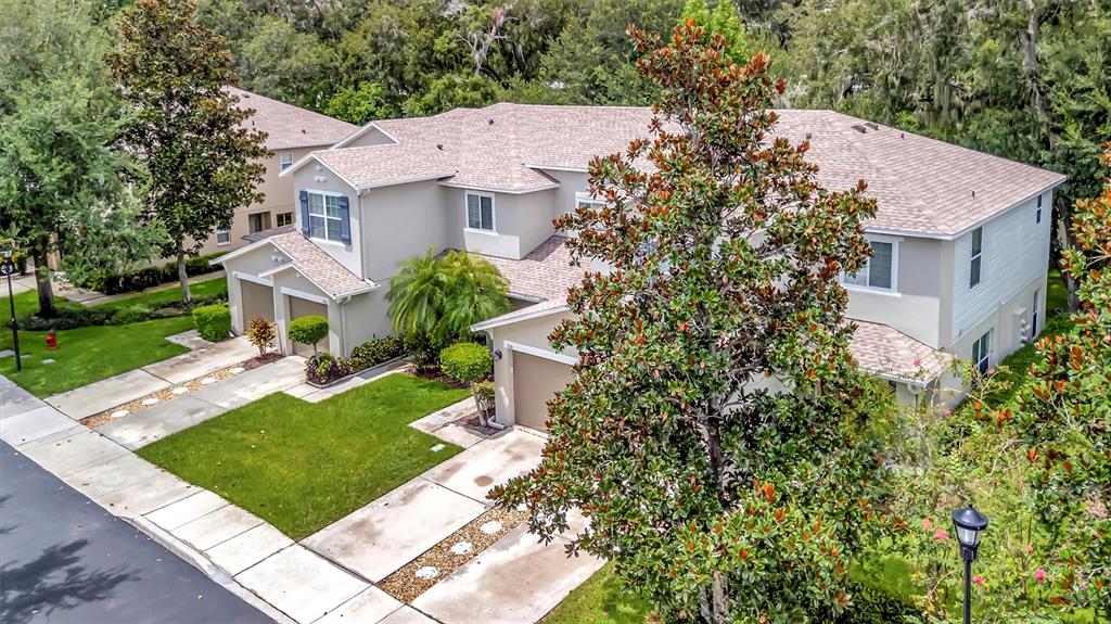 2928 Royal Tuscan Lane Valrico, FL 33594 - Photo 9 of 62 front view of a house with a yard