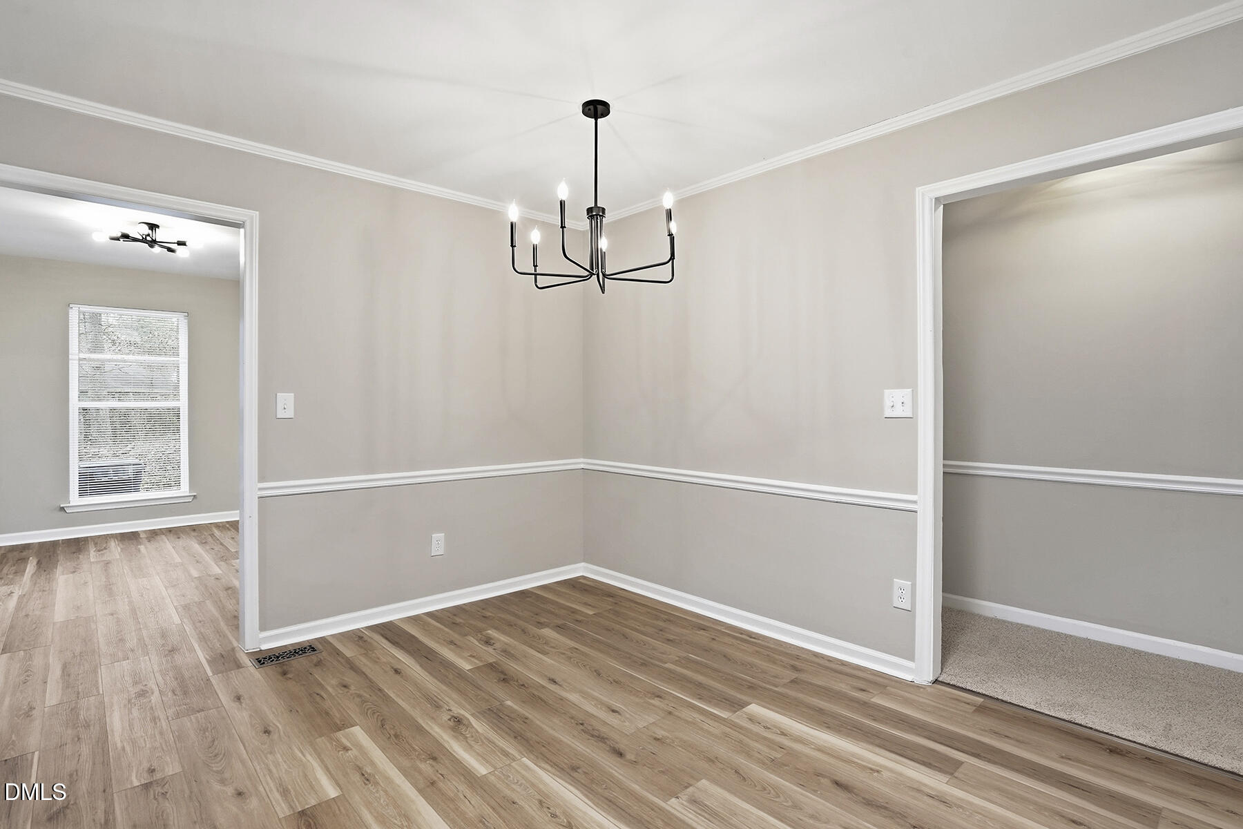 812 Chalk Level Road Durham, NC 27704 - Photo 12 of 31 a view of a room with wooden floor closet and windows