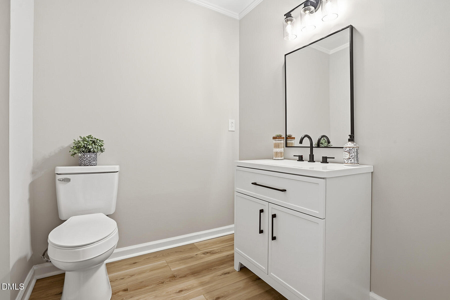 812 Chalk Level Road Durham, NC 27704 - Photo 16 of 31 a bathroom with a sink mirror and toilet