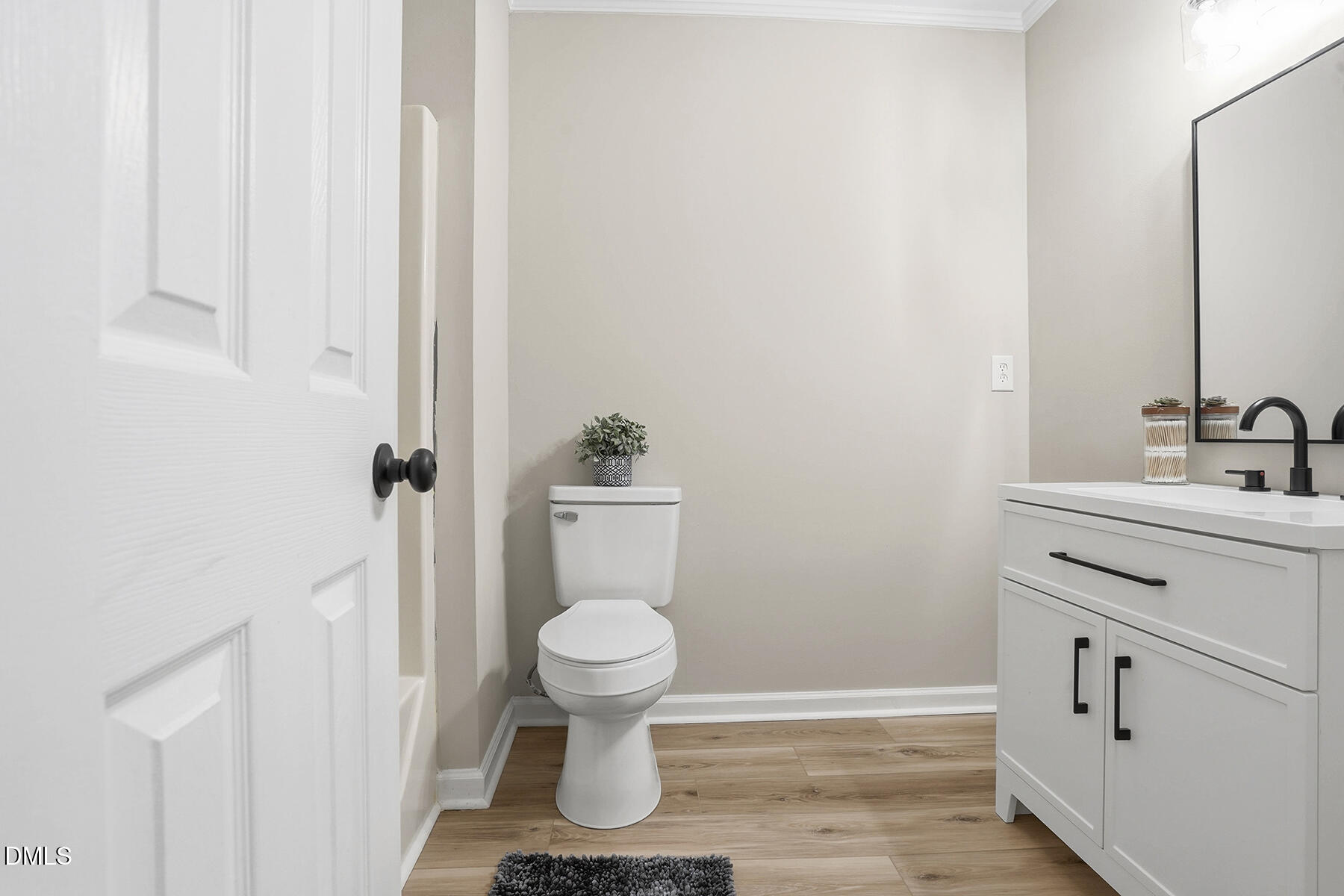812 Chalk Level Road Durham, NC 27704 - Photo 17 of 31 a bathroom with a sink toilet and shower