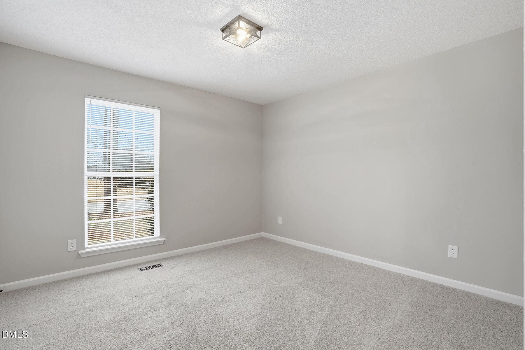 812 Chalk Level Road Durham, NC 27704 - Photo 18 of 31 an empty room with a window