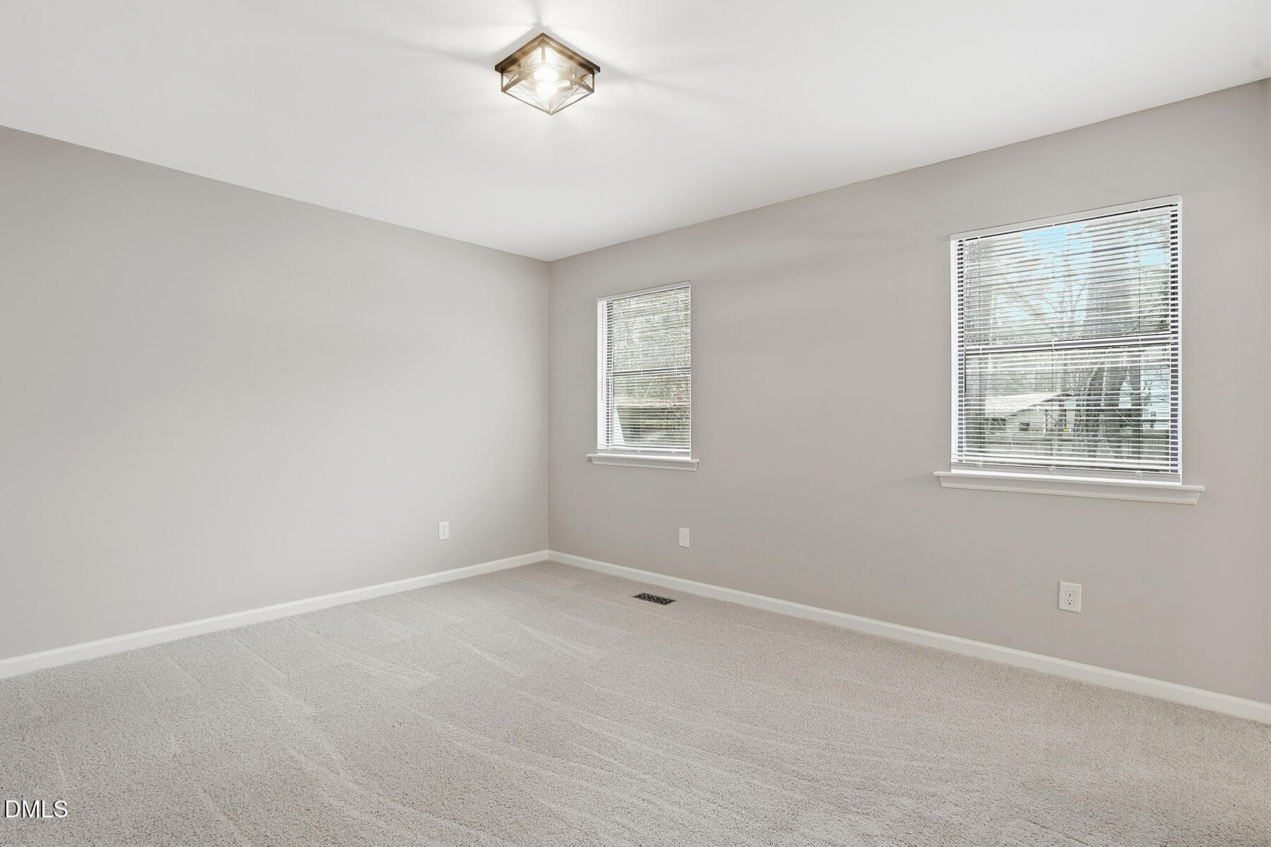 812 Chalk Level Road Durham, NC 27704 - Photo 21 of 31 a view of an empty room with a window