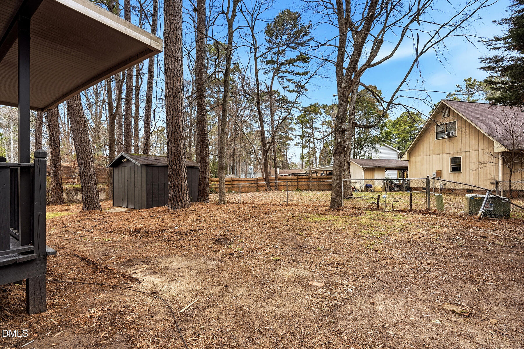 812 Chalk Level Road Durham, NC 27704 - Photo 28 of 31 a white house with a large tree in front of it
