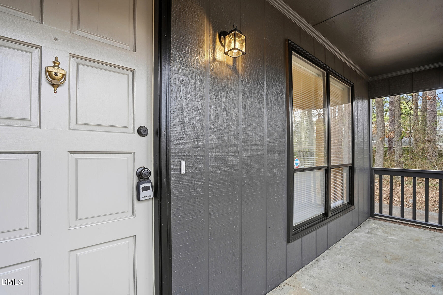 812 Chalk Level Road Durham, NC 27704 - Photo 3 of 31 a view of a hallway with wooden floor and windows