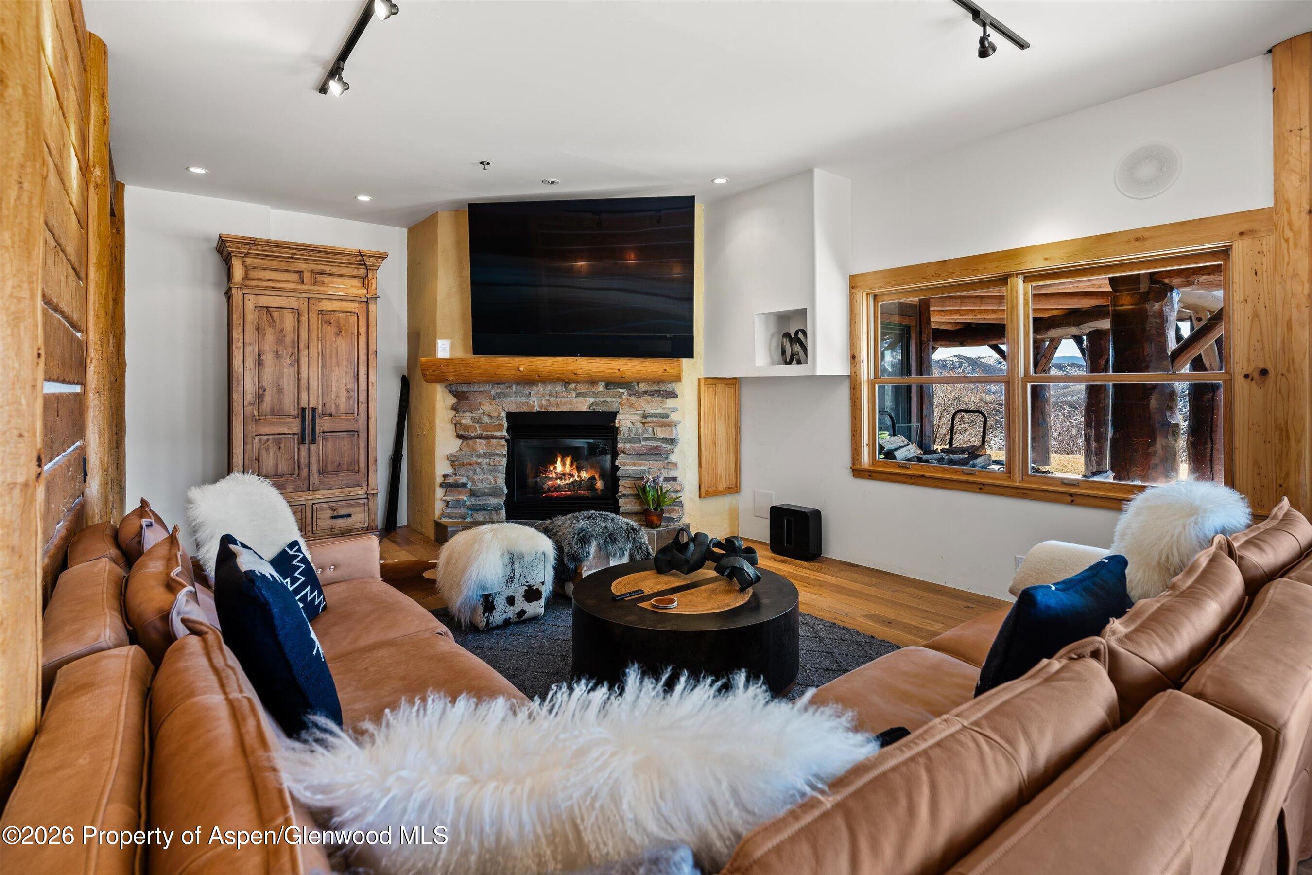 1450 Mesa Road Snowmass, CO 81654 - Photo 33 of 49 12LowerLevelLivingArea2