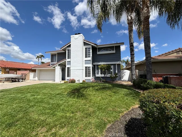 a house view with a garden space