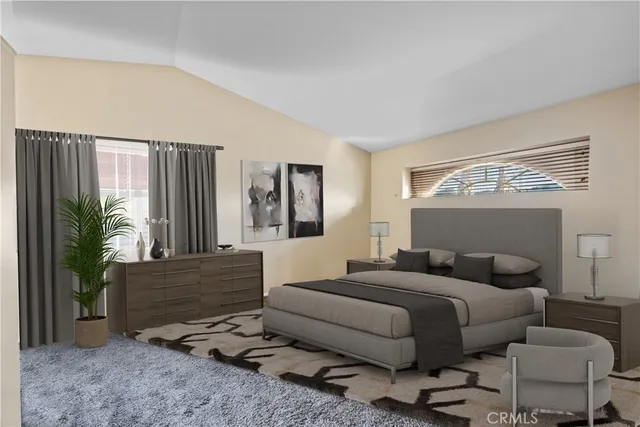 a bedroom with furniture and a potted plant