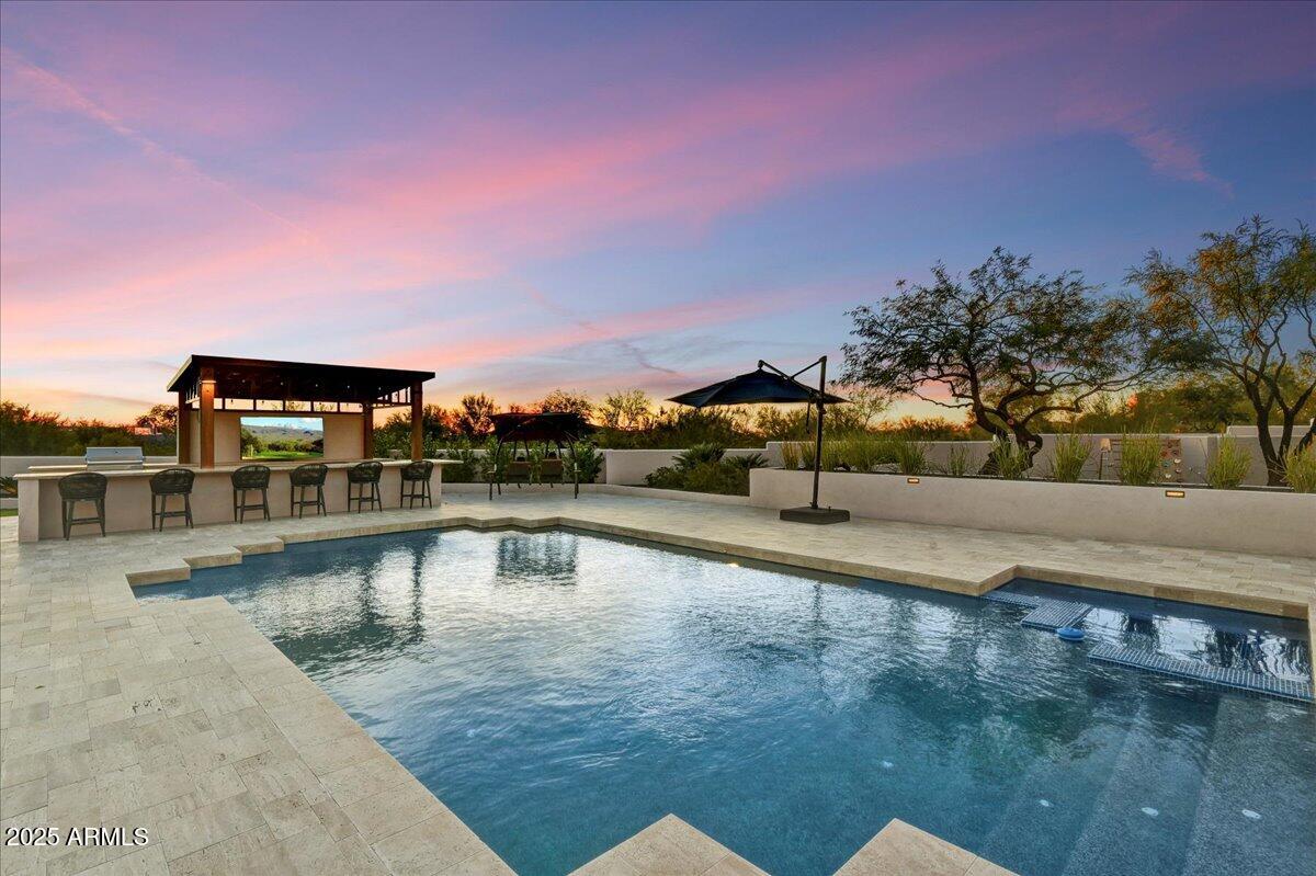 25255 North 90th Way Scottsdale, AZ 85255 - Photo 11 of 41 a view of a swimming pool with an outdoor seating